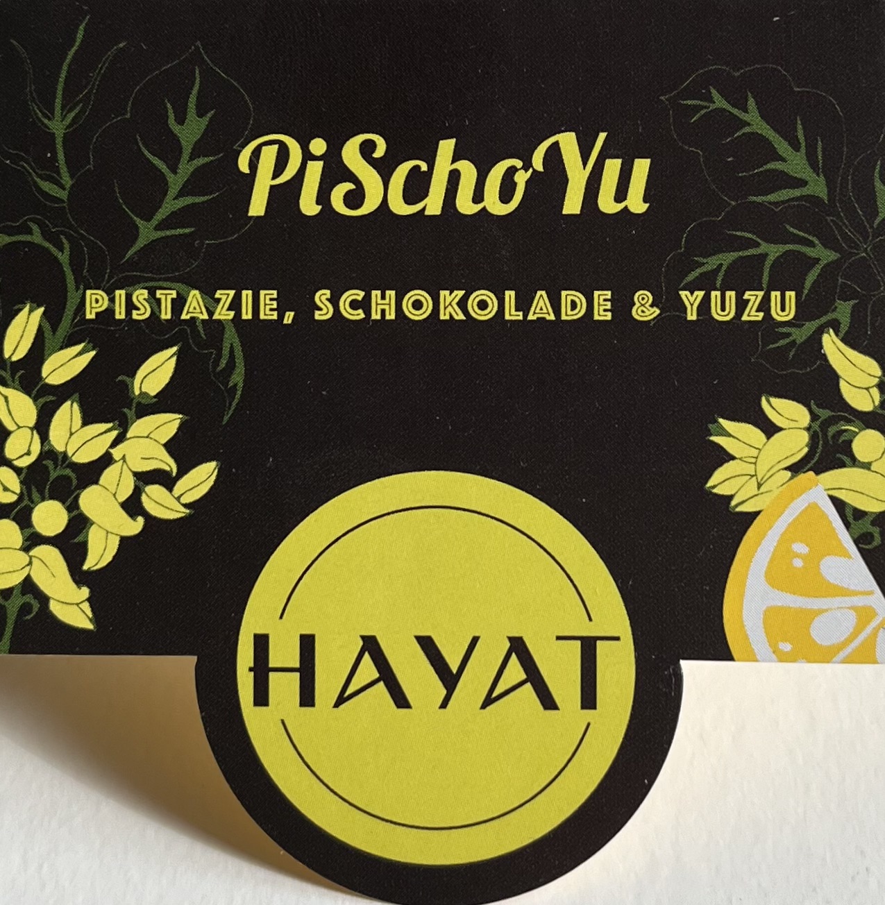 PiSchoYu; Pistazien im Schokoladenmantel mit Yuzu; hayat-trading.com; https